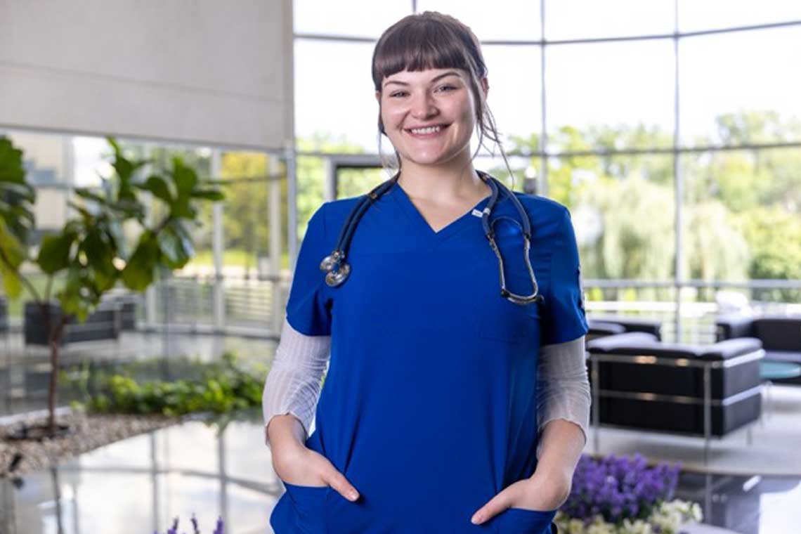 Madonna nursing student smiling in lobby