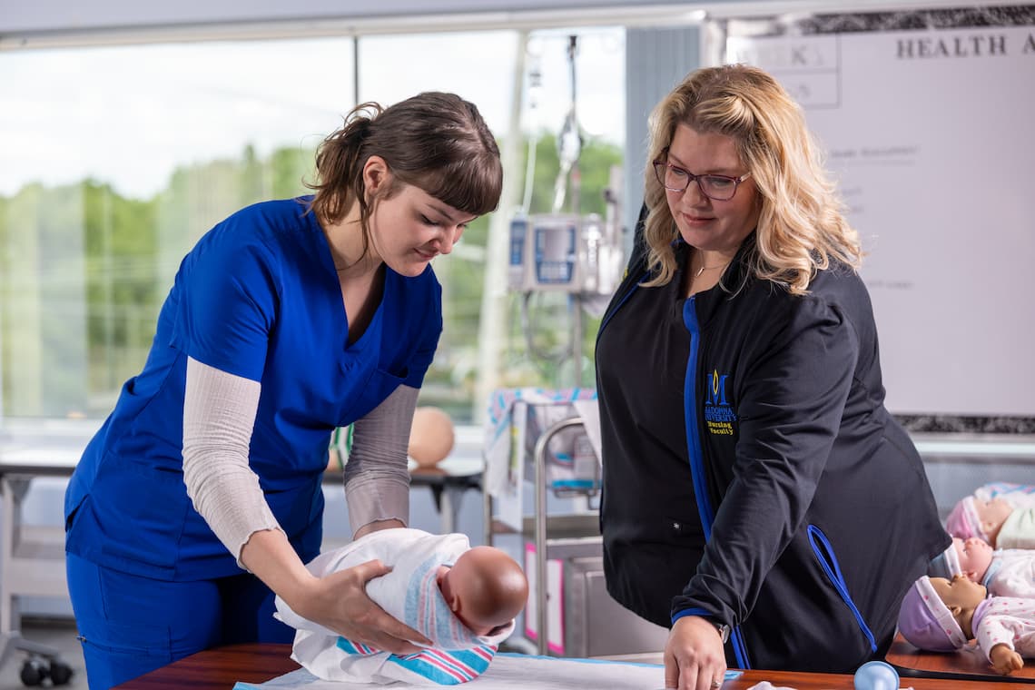 Nurses with baby